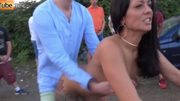 MILF Takes Every Cock One By One In Public!